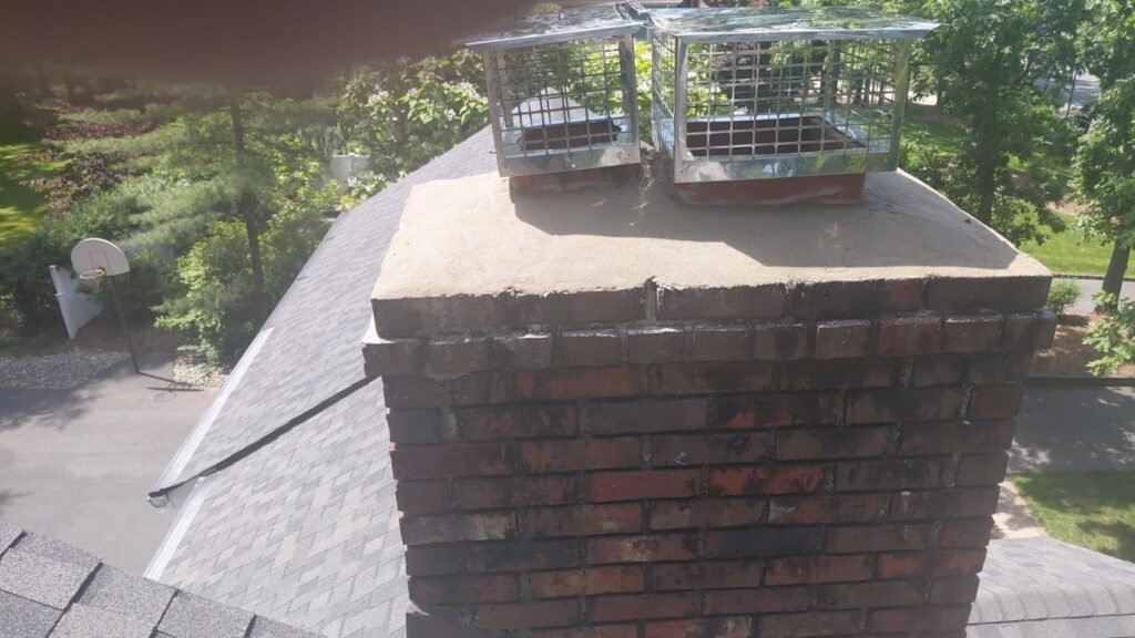 Exterior view of the repaired chimney crown with a new cap installed